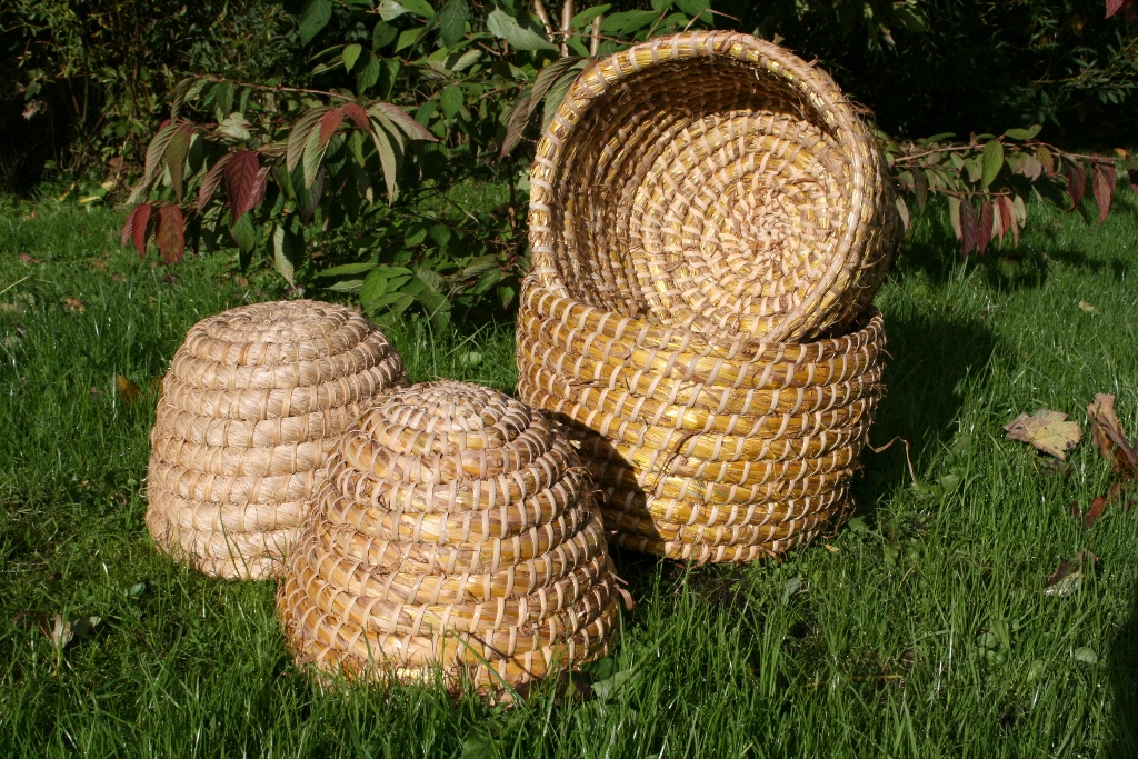 Four Bee Skeps, small domed grass, small domed oaten straw, two swarm skeps 